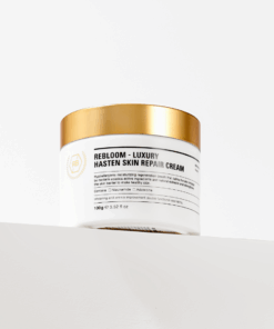 A rich yet gentle repair cream designed to comfort dry, sensitive, and weakened skin. Formulated with Centella Asiatica and plant-based active ingredients, this cream helps calm irritation, reinforce the skin barrier, and restore a healthy, supple appearance. Perfect for daily use and ideal as post-treatment care after professional skin procedures. Rebloom Luxury Hasten Skin Repair Cream (100g) Benefits Strengthens and protects the skin’s natural moisture barrier Helps soothe stressed and irritated skin Supports skin repair with Centella Asiatica actives Leaves skin soft, smooth, and visibly healthier Ideal For Dry and dehydrated skin Sensitive or fragile skin Dull, rough, or tired-looking skin Skin weakened by environmental stress Post-procedure care (extractions, laser, peeling, microneedling) Key Features Gentle Daily Repair Cream A balanced, mild formula suitable for everyday use without burdening the skin Triple Barrier Care Complex Ceramide NP, Allantoin, and Dipotassium Glycyrrhizate help protect, soothe, and maintain skin comfort Centella Asiatica Complex Contains a standardized amount of Centella extract and active compounds to support calming and skin recovery Brightening & Anti-Wrinkle Care Infused with Niacinamide and Adenosine for improved skin tone and elasticity Botanical-Rich Formula Enriched with carefully selected natural ingredients including Gold Powder, Borage Seed Oil, Wheat Sprout, Soybean, Sophora Japonica, Broccoli Sprout, Magnolia Sprout, and Green Tea Extract Ingredients (INCI) Water, Butylene Glycol, Glycerin, Beta-Glucan, C14-22 Alcohols, C12-20 Alkyl Glucoside, Grape Seed Oil, Squalane, Caprylic/Capric Triglyceride, Niacinamide, Beeswax, 1,2-Hexanediol, Centella Asiatica Extract, Gold Powder, Borage Seed Oil, Wheat Sprout Extract, Broccoli Sprout Extract, Soybean Sprout Extract, Clove Sprout Extract, Sophora Japonica Sprout Extract, Magnolia Sprout Extract, Green Tea Extract, Tocopheryl Acetate, Allantoin, Dipotassium Glycyrrhizate, Panthenol, Ceramide NP, Asiaticoside, Asiatic Acid, Madecassic Acid, Sodium Hyaluronate, Dimethicone, Polysorbate 60, Sorbitan Stearate, Polyacrylate-13, Polyisobutene, Polysorbate 20, Arginine, Carbomer, Adenosine, Fragrance 1231